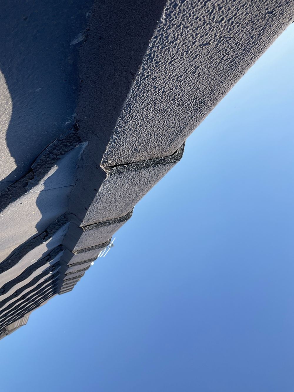 Roof cladding still incomplete at the handover inspection, found during a pre-handover inspection in Aintree