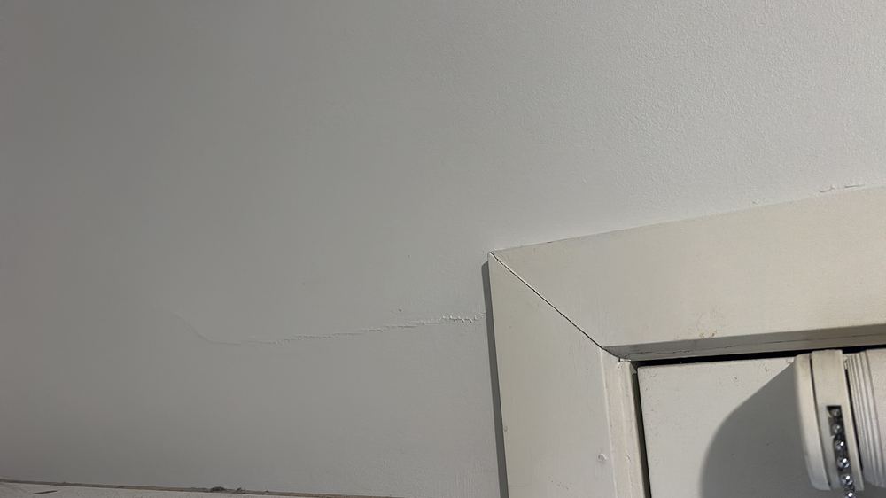 Cracks running from the corners of an opening, a sign of soil movement, found during a pre-purchase inspection in Braybrook